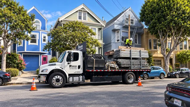 Scaffolding delivery on a San Francisco residential street.